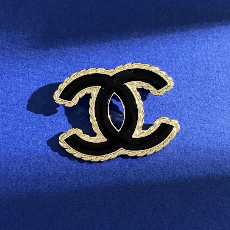 Ch*el brooches